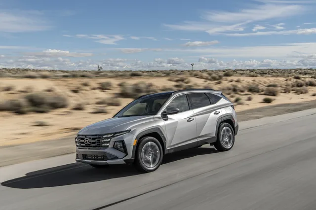 2025 Hyundai Tucson Front Three-Quarter Driving Shot in Silver