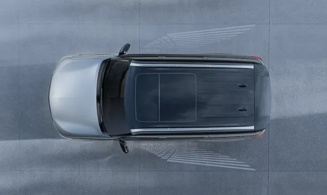 2025 Infiniti QX80 overhead view with welcome light projections