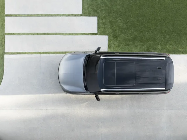 2025 Infiniti QX80 aerial view showing panoramic moonroof