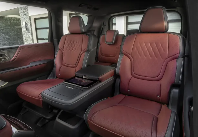 2025 Infiniti QX80 second row captain's chairs in burgundy