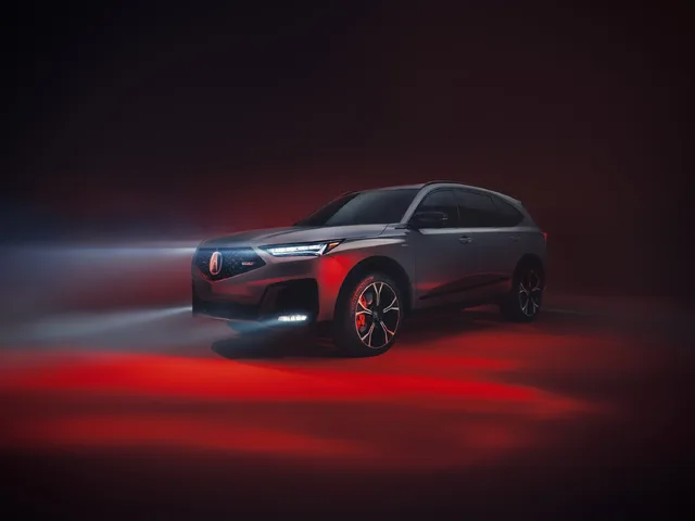 2025 Acura MDX Type S Front Three-Quarter Studio Shot with Red Lighting