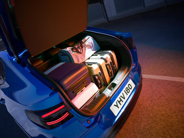 2024 Ford Capri cargo area loaded with luggage in Blue