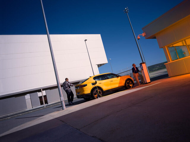 2024 Ford Capri in Vivid Yellow charging at a public station