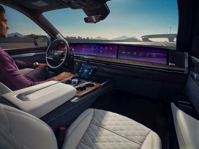 2025 Cadillac Escalade Interior with Driver and Desert Highway
