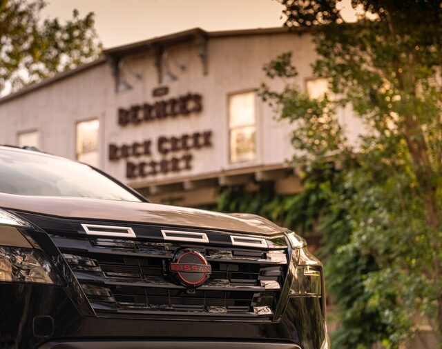 2025 Nissan Rogue Rock Creek Front Grille Close-Up at Dusk