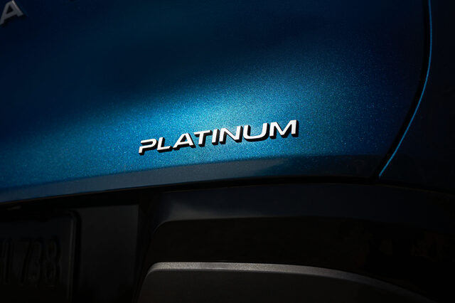2025 Nissan Murano Platinum badge close-up on blue paint