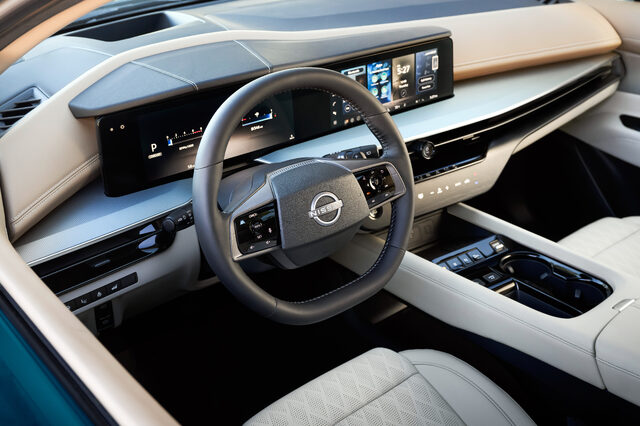 2025 Nissan Murano steering wheel and dual-screen dashboard