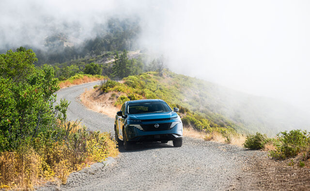2025 Nissan Murano front view from distance on mountain road