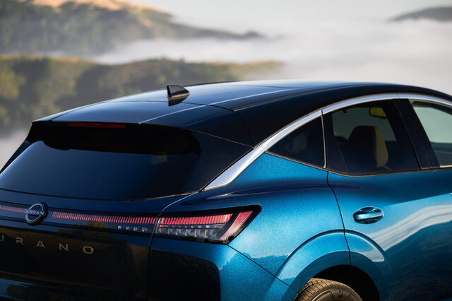 2025 Nissan Murano rear three-quarter view with mountains and fog
