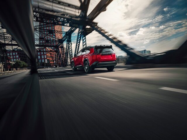 2026 Toyota RAV4 GR Sport Rear Three-Quarter Action on Bridge