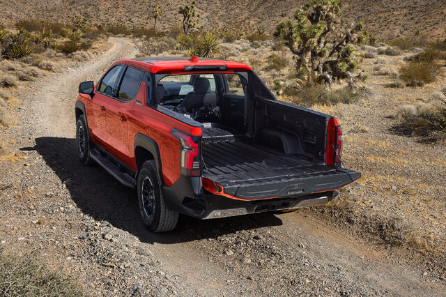 2026 Chevrolet Silverado EV Trail Boss Midgate and Tailgate Open on Desert Trail