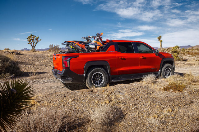 2026 Chevrolet Silverado EV Trail Boss Hauling Dirt Bikes in Extended Bed