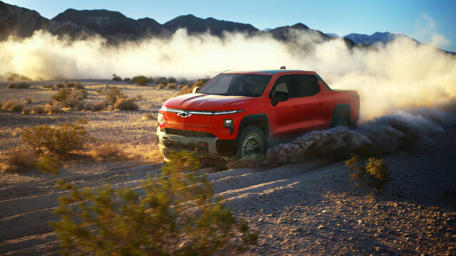 2026 Chevrolet Silverado EV Trail Boss Front Three-Quarter Desert Action