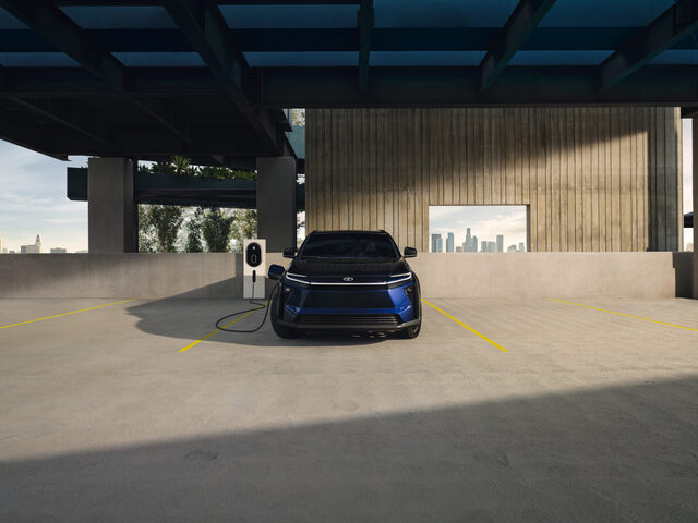 2026 Toyota bZ in Blue Plugged In at Charging Station