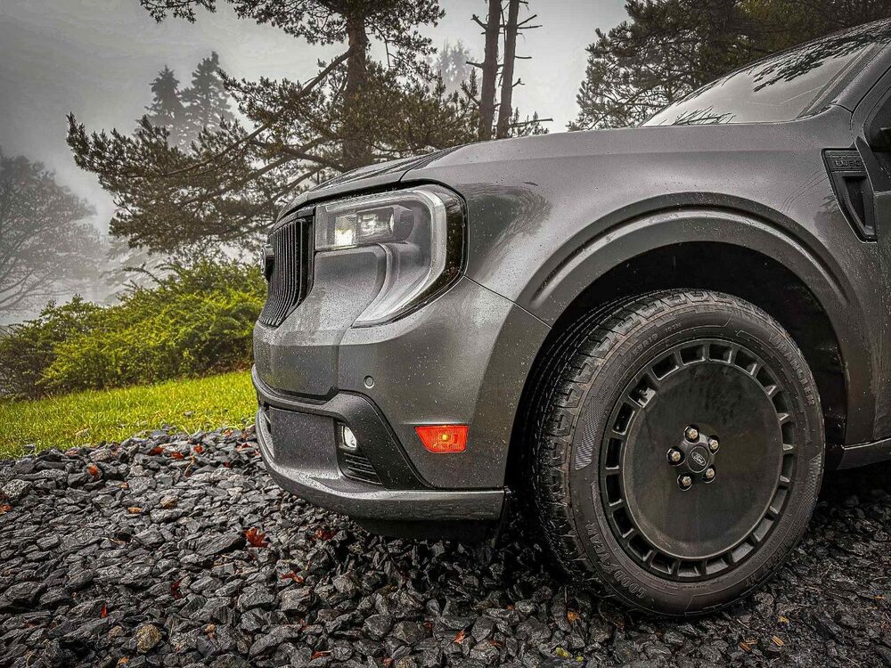 2025 Ford Maverick Lobo front grille from the side and displying black disk wheels