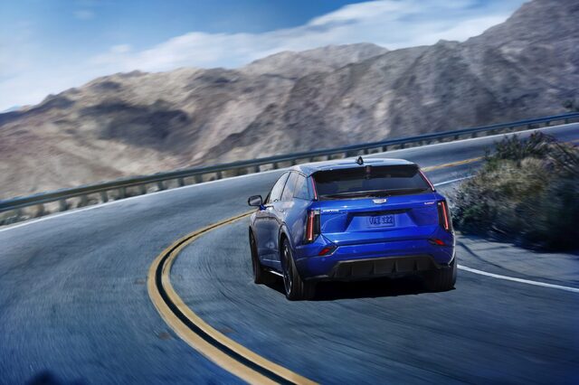 2026 Cadillac OPTIQ-V Rear Three-Quarter Action Shot