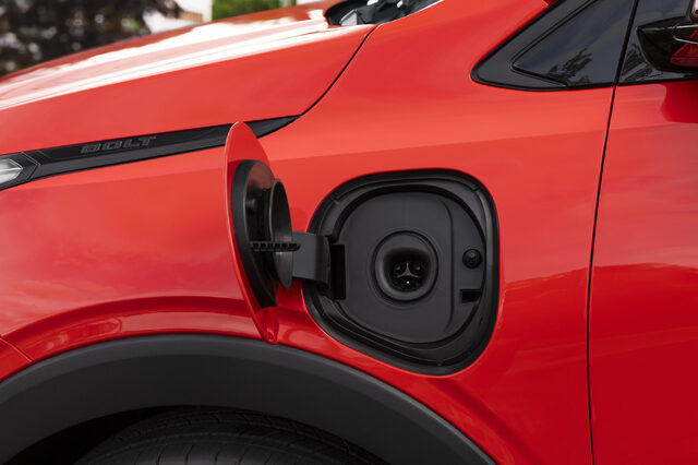 2027 Chevrolet Bolt Charging Port Close-Up in Red