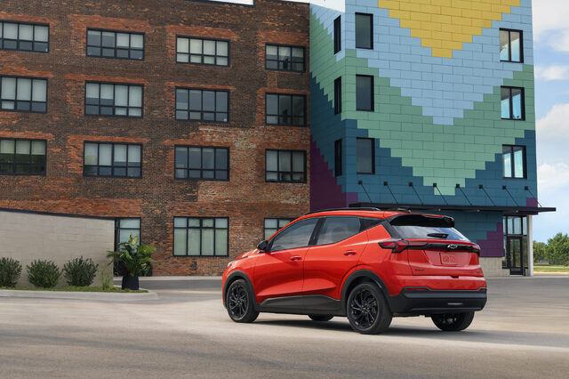 2027 Chevrolet Bolt Rear Three-Quarter View in Red
