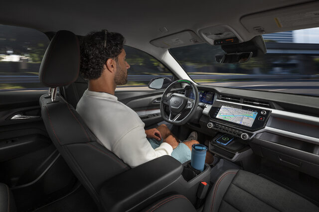 2027 Chevrolet Bolt Interior With Driver Using Navigation