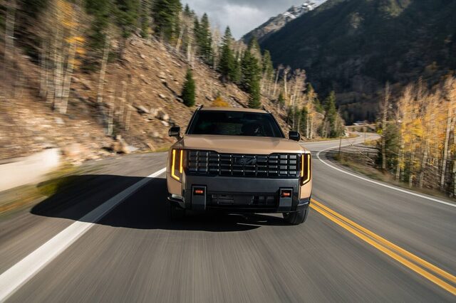 2027 Kia Telluride X-Pro Front Action Shot on Mountain Highway