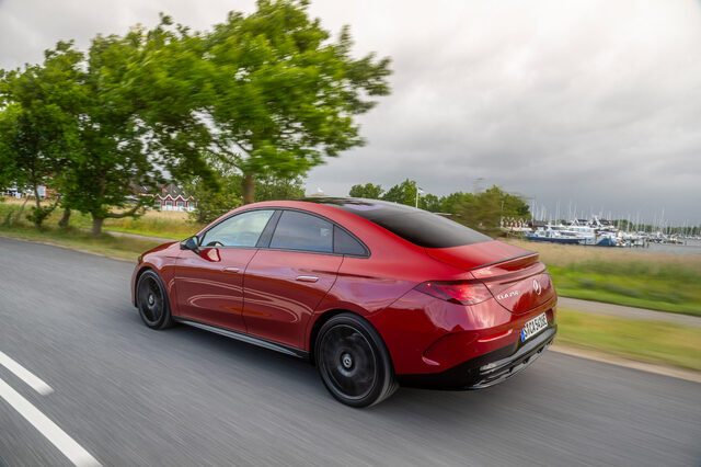 2026 Mercedes-Benz CLA EV Rear Three-Quarter Driving Shot