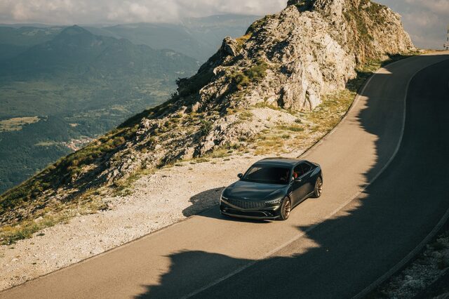 Genesis X Gran Coupe Concept Elevated View on Italian Mountain Switchback