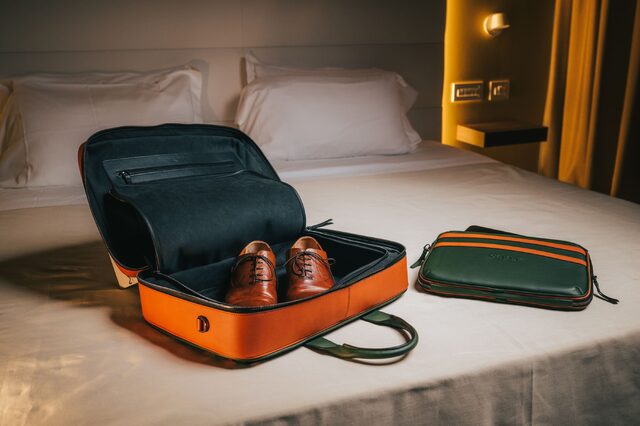 Genesis X Gran Coupe Concept Branded Leather Travel Accessories on Hotel Bed