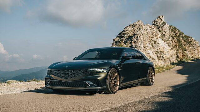 Genesis X Gran Coupe Concept Front Three-Quarter View on Mountain Road