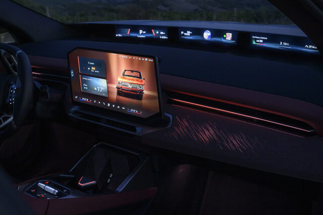 2026 BMW iX3 Dashboard at Night with Ambient Lighting and Panoramic Display