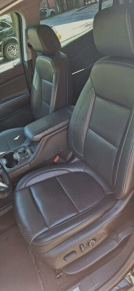 2023 GMC Acadia - front seats and center console