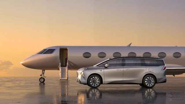 2026 Buick Electra ENCASA Silver Exterior Beside Private Jet