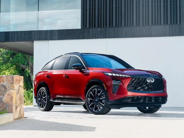 2027 Infiniti QX65 Sport Exterior Front Three-Quarter View Sunfire Red with Black Roof and Running Boards