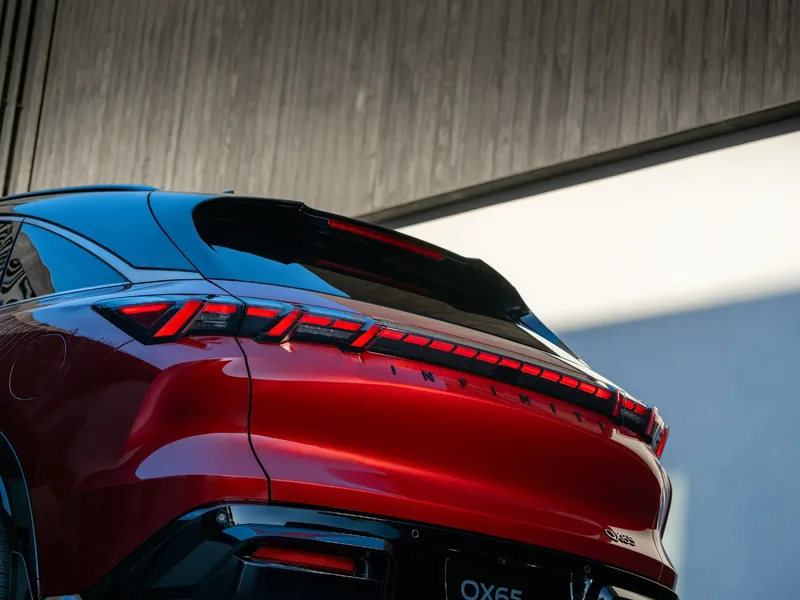 2027 Infiniti QX65 Sport Exterior Rear Closeup Illuminated Full-Width LED Taillight Bar with INFINITI Lettering