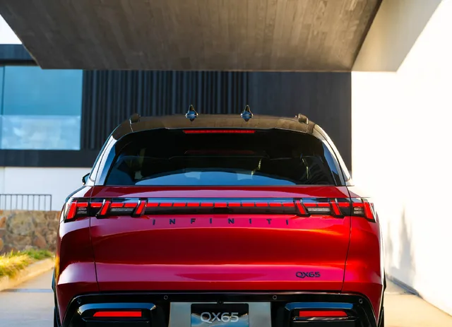 2027 Infiniti QX65 Sport Exterior Direct Rear View Full-Width LED Taillight Bar with INFINITI Lettering Sunfire Red