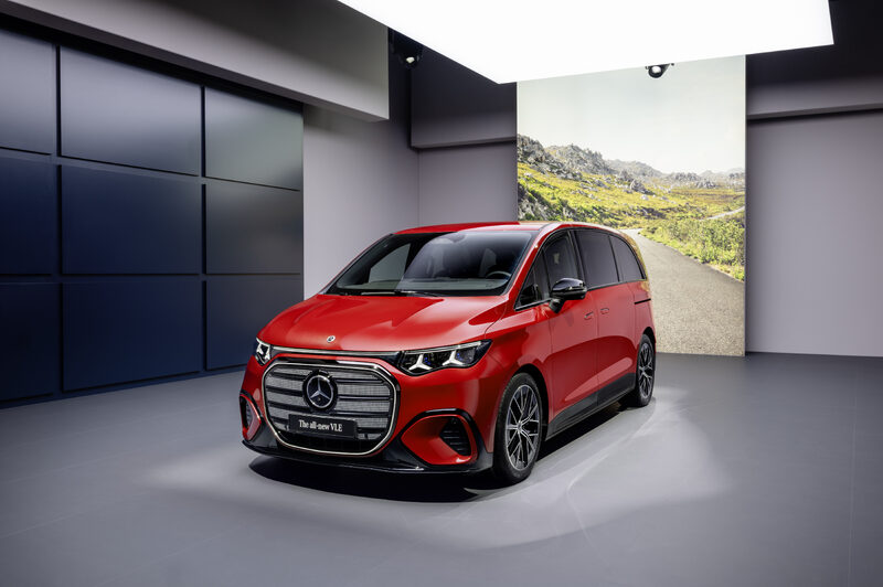 2027 Mercedes-Benz VLE MPV front three-quarter view in red with AMG-Line wheels