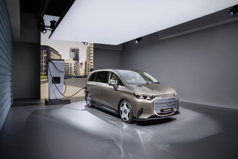 2027 Mercedes-Benz VLE MPV front three-quarter view plugged into DC fast charger