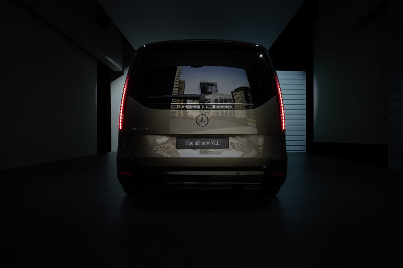 2027 Mercedes-Benz VLE MPV rear view in bronze with illuminated taillights