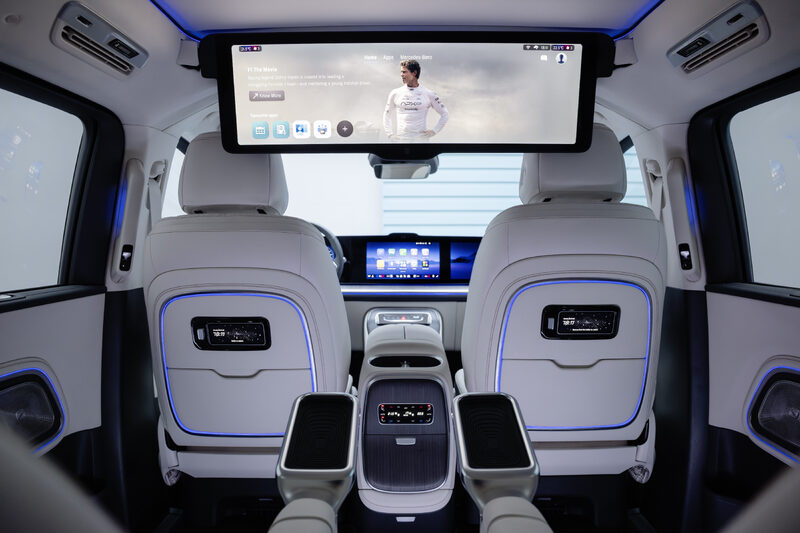 2027 Mercedes-Benz VLE MPV second-row passenger watching ceiling-mounted entertainment screen