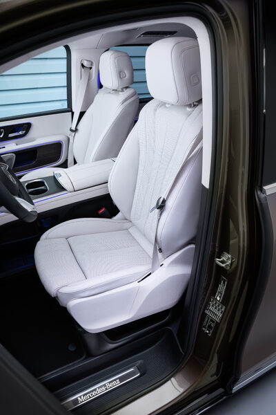 2027 Mercedes-Benz VLE MPV front seats in cream leather through open sliding door