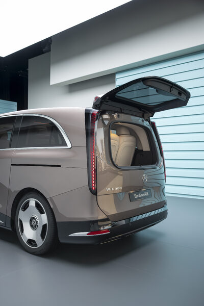 2027 Mercedes-Benz VLE MPV rear three-quarter view with power liftgate open in champagne