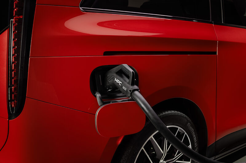 2027 Mercedes-Benz VLE MPV HPC Charging Port Close-Up in Red