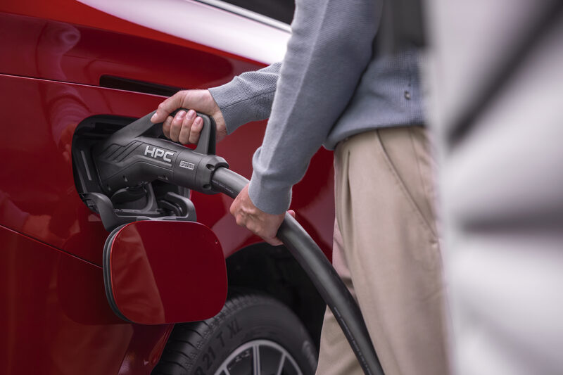 2027 Mercedes-Benz VLE MPV HPC Charging Port Close-Up in Red