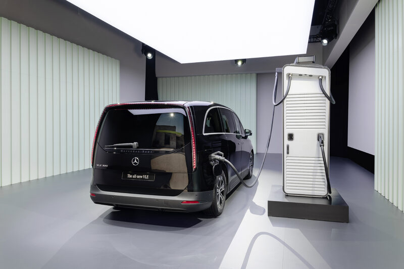 2027 Mercedes-Benz VLE MPV Rear Three-Quarter with DC Fast Charger in Black