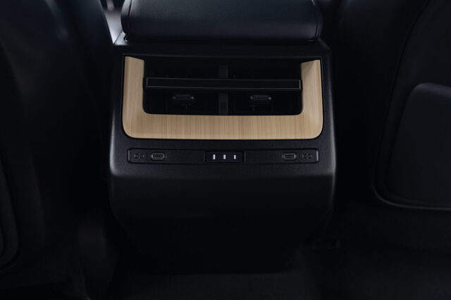 2026 Lexus ES 500e Luxury Rear Center Console with USB-C Ports and Wood Trim