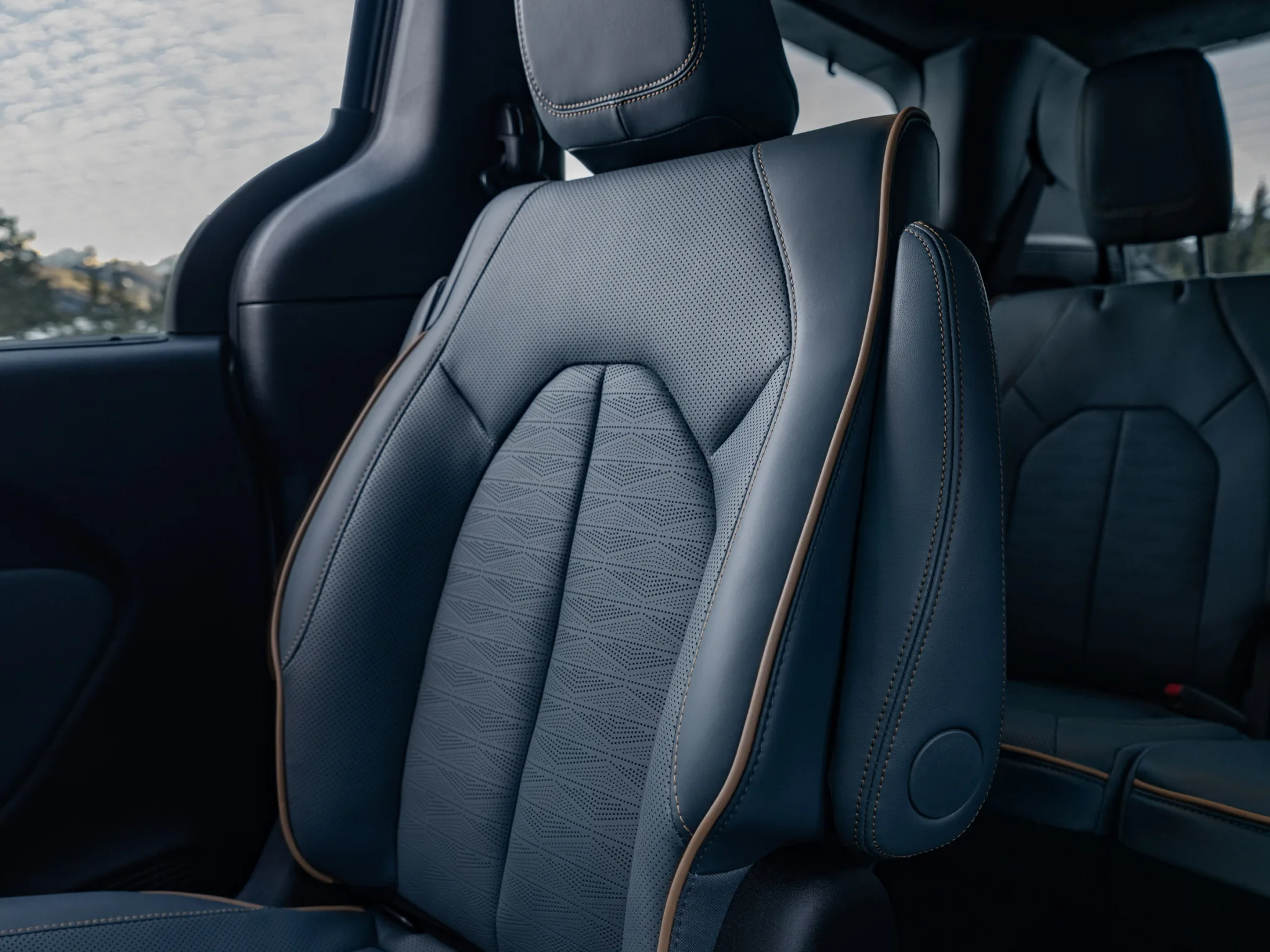 2027 Chrysler Pacifica Pinnacle Blue Agave Nappa leather seat with Parquet perforation pattern and Sol Stopper copper accent stitching