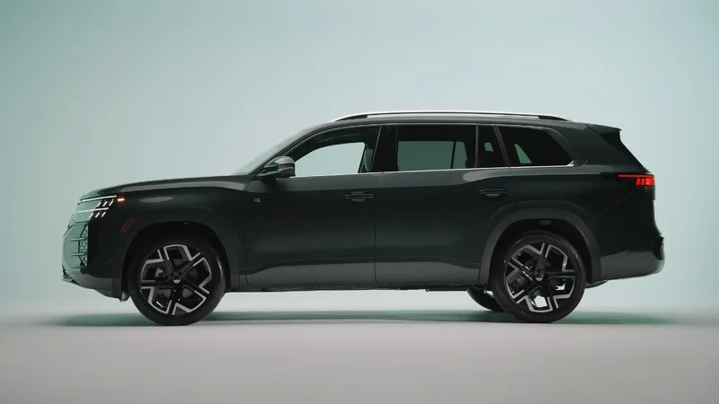 2027 Volkswagen Atlas side profile in Sacramento Green