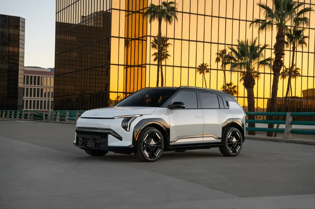 2027 Kia EV3 Front Three-Quarter View, White Exterior with Gold Accents
